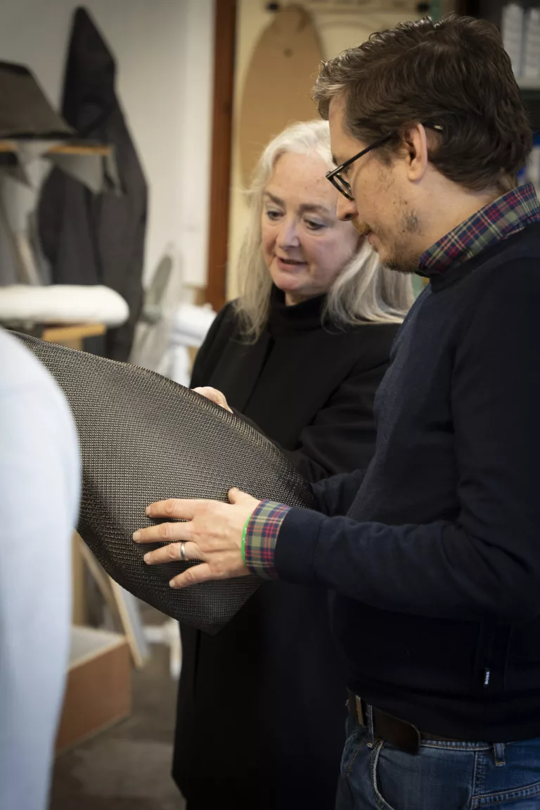 Christina Milnes Managing Director of Wilson Benesch explains the Carbon - PET material that is made for Wilson Benesch to Ben of The Audiobarn