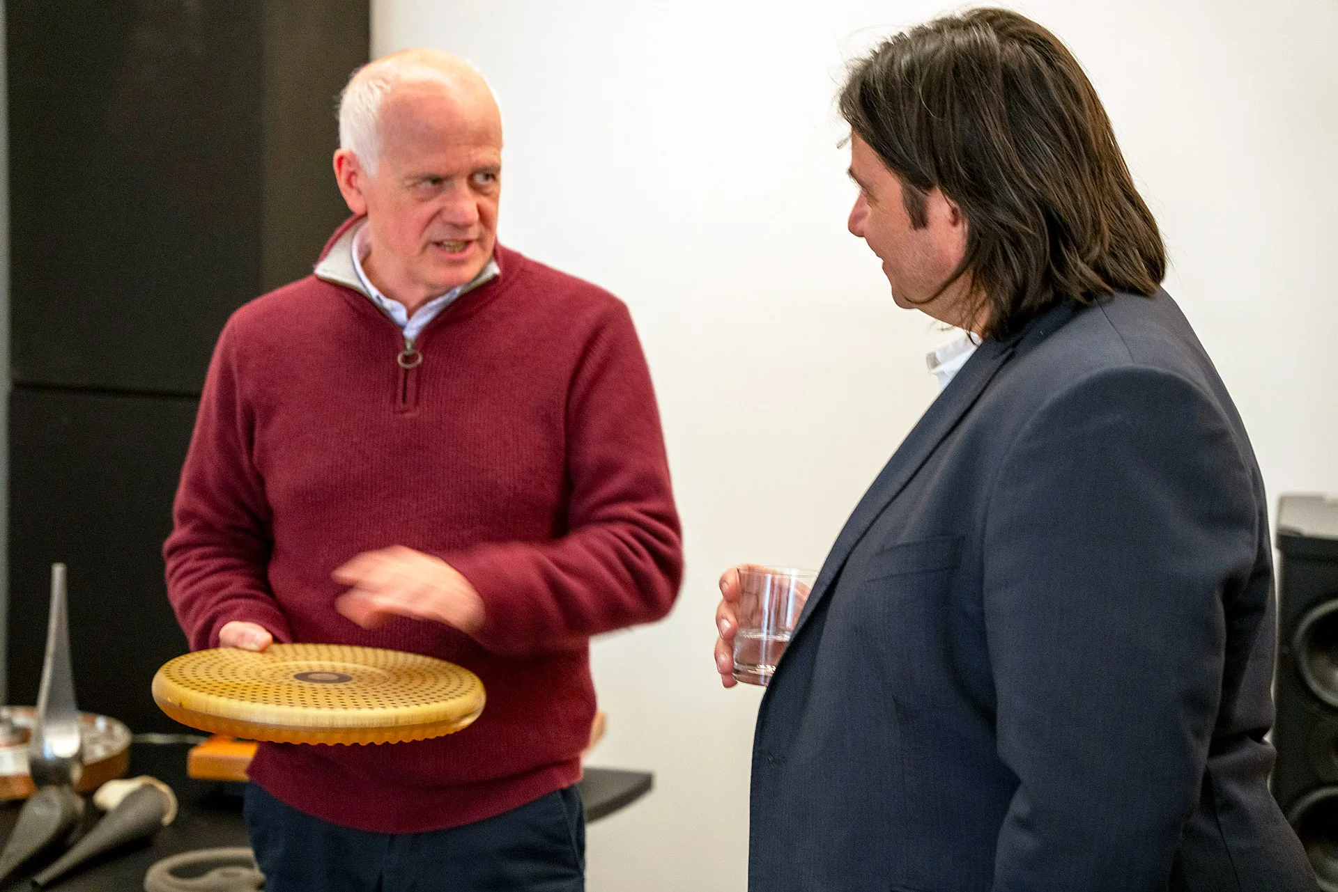 Design Director Craig Milnes showing George one of the very first turntable platter designs developed for the GMT System under the grant project entitled 'The Mondrian Project'.